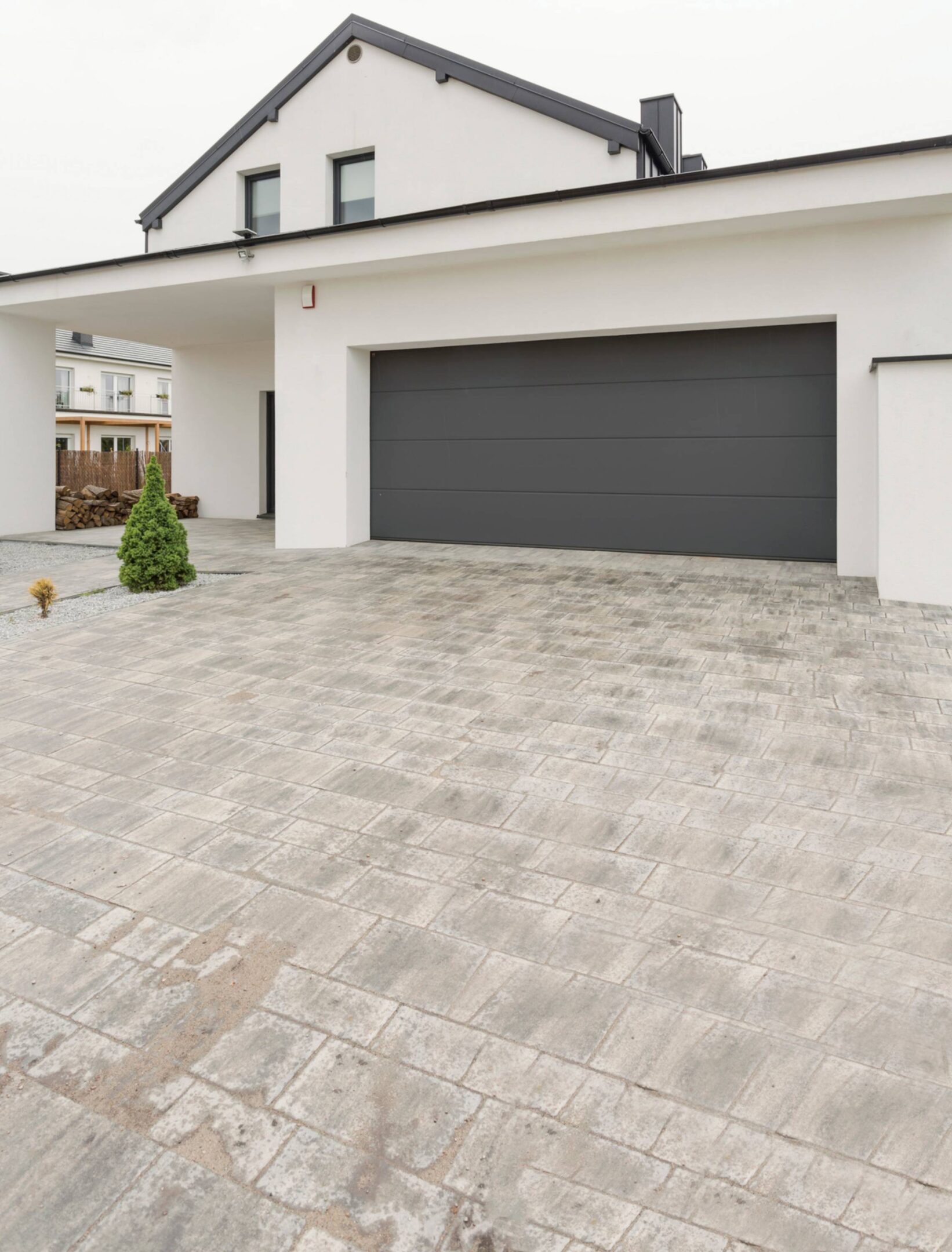 Contemporary home with paved driveway